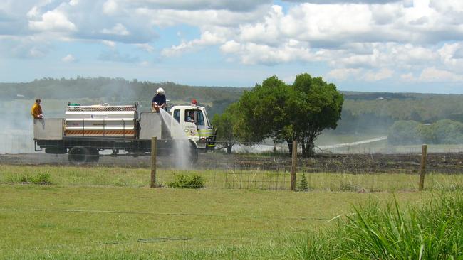 Childers Rural Fire Brigade working to control a grass fire on North Isis Road previously. Photo: File