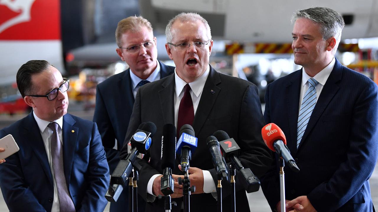 Prime Minister Scott Morrison has said overseas travel will be open when the country hits 80 per cent vaccination rate. Picture: AAP Image/Joel Carrett.