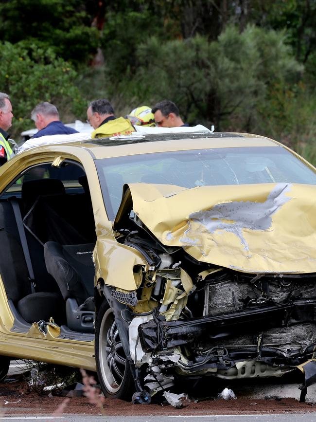 Horrific scenes at the crash on the Pacific Highway. Picture by Peter Lorimer.