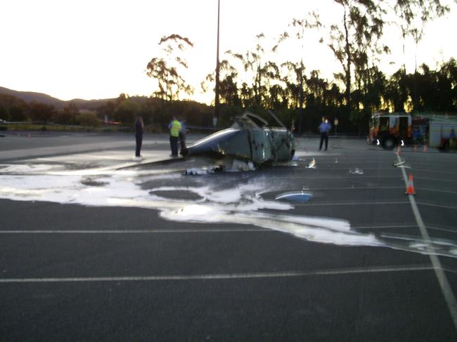 Police on the scene of the 2009 chopper crash on the Gold Coast. Picture: AAP Image/Crystal Ja