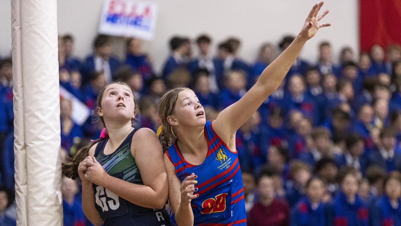 Veronica Farrow (left) of St Ursula's Senior A against Emily Bidgood of Downlands First VII in Merici-Chevalier Cup netball at Salo Centre, Friday, July 19, 2024. Picture: Kevin Farmer