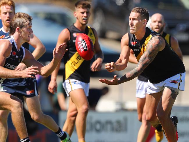 30.3.2018.SANFL. South vs Glenelg at Hickinbotham Oval, Noarlunga.Jesse White gets a handball away.   PIC:TAIT SCHMAAL.