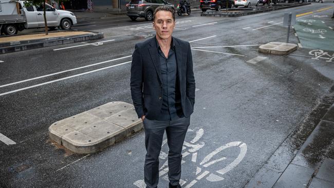 Anthony Koutoufides said the protected bike lanes on Exhibition must be replaced with narrower bike lanes to allow for cars to park. Picture: Jake Nowakowski