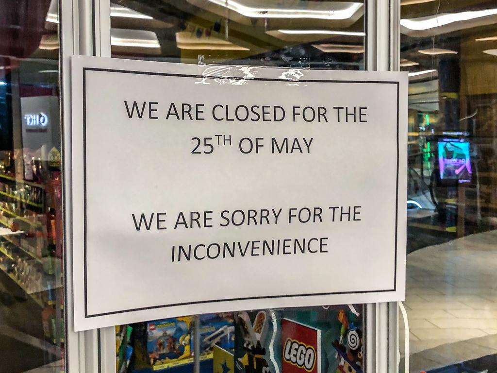 A sign on Toy World at Highpoint telling customers they are temporarily closed. Picture: Jason Edwards