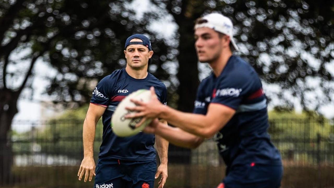 Retired Sydney Roosters champion Cooper Cronk training with Kyle Flanagan.
