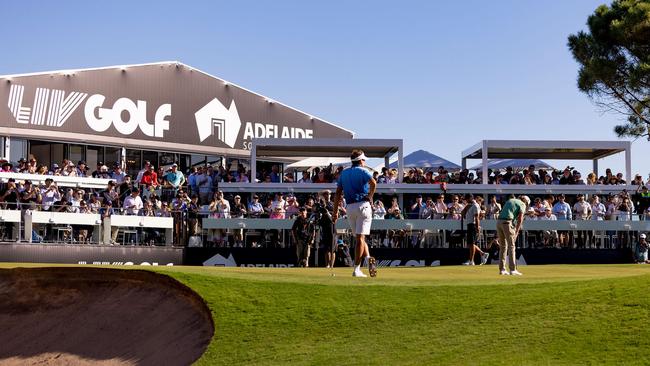 Cameron Smith putting on the Watering Hole with Ian Poulter watching on at LIV Golf Adelaide. Picture: SATC