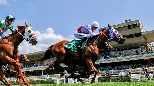 Jockey Jay Ford salutes on Its Fait Accompli in front of the ageing Warwick Farm facilities. Picture: AAP