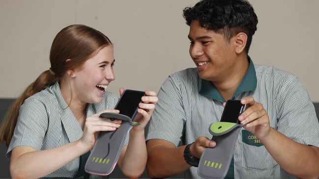 Amber Benz 14, Jay-J Lavatai 15 from Corinda State High School, the first Queensland school to trial Yondr pouches. Picture: Peter Wallis