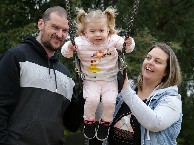 Kim Simmons and partner Luke Malins with Alyssa. Picture: George Salpigtidis