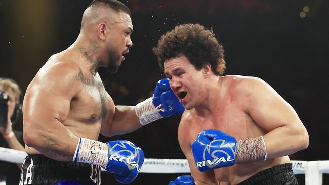 Liam Talivaa throws a punch in the heavyweight fight between Louis Marsters and him on the Paul Gallen and Justin Hodges fight night in Sydney.