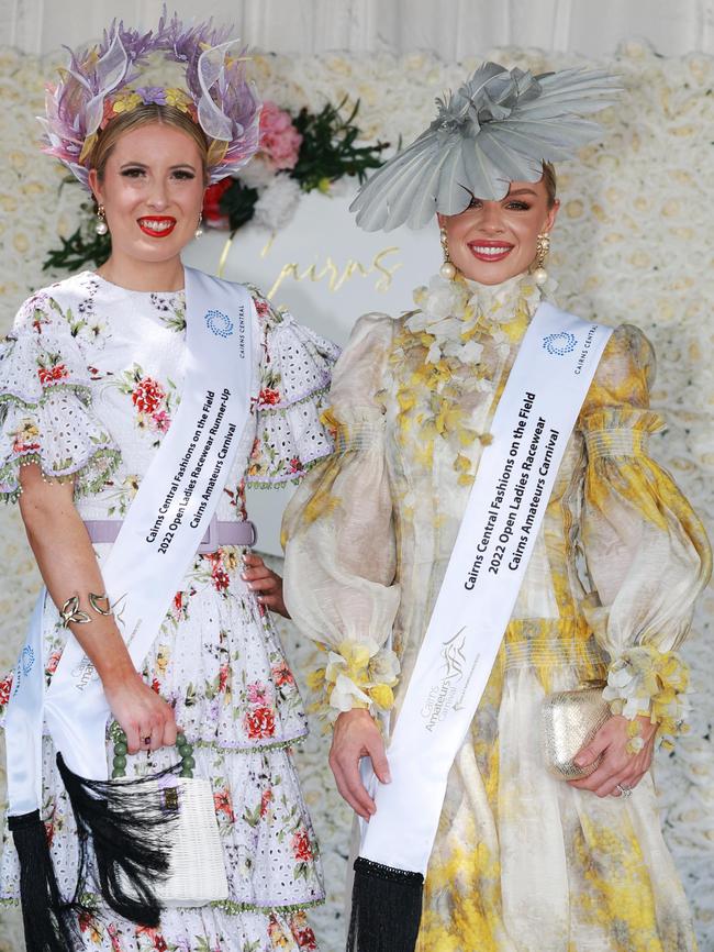 Cairns Amateurs Fashions on the Field Open Ladies fashion runner up Kate Lynch and winner Brittney Tamou at Cairns Amateurs Ladies Day, held at Cannon Park. Picture: Brendan Radke