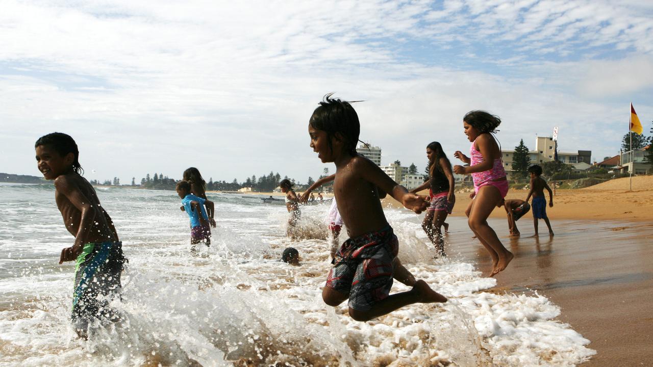 <b>Psalm 34: Taste, and see how sweet the Lord is; blessed is the man who trusts in Him. </b> <br/>Aboriginal children from the community of Brewarrina in the far west of NSW, play at the beach for the first time at South Narrabeen Beach in Sydney. Photo by Krystle Wright