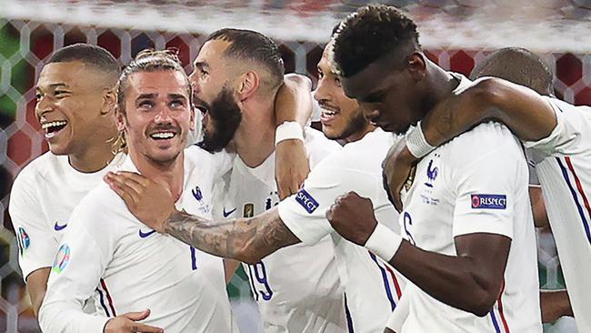 Karim Benzema celebrates with teammates against Portugal. Picture: AFP