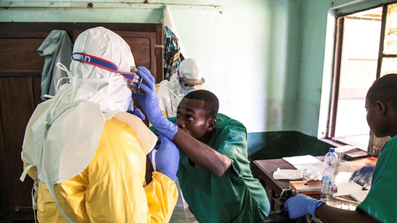 In 2018 health workers wear protective equipment as they prepare to attend to suspected ebola patients at Bikoro Hospital, Democratic Republic of Congo. Picture: AFP/UNICEF/Mark Naftalin