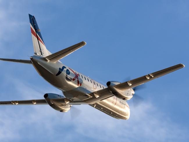 Adelaide, Australia - REX (Regional Express Airlines) Saab 340 twin engined regional commuter aircraft taking off from Adelaide Airport.Escape 15 October 2023Doc HolidayPhoto - iStock