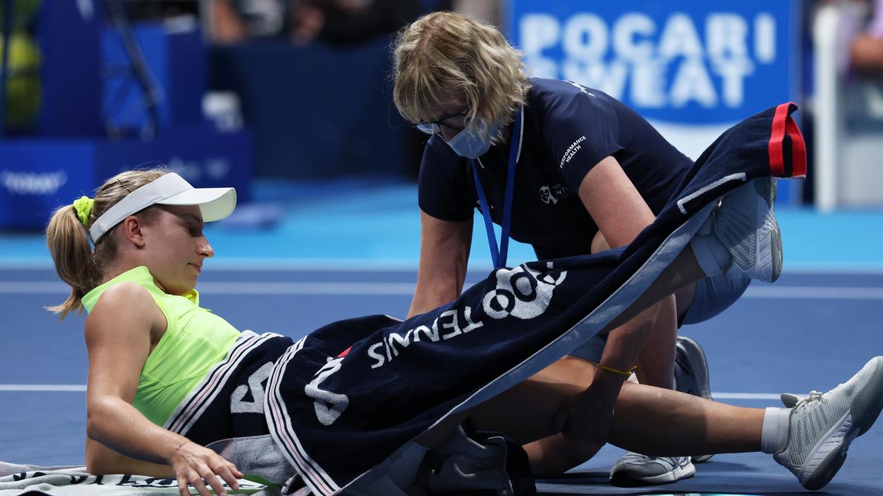 Daria Saville receives medical attention. (Photo by Kiyoshi Ota/Getty Images)