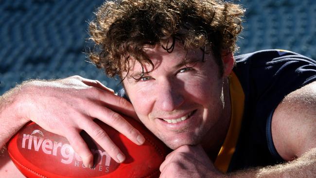 Adelaide Crows footballer Ken McGregor holds a football back in his playing days, and now Steven Marshall’s PR hopes and dreams.