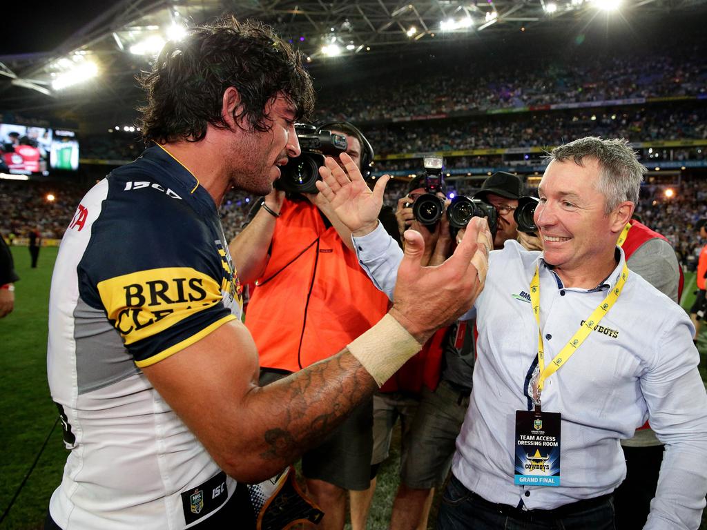 Johnathan Thurston and Paul Green after winning the 2015 NRL Grand Final between the Brisbane Broncos and North Queensland Cowboys at ANZ Stadium, Sydney. Pics Adam Head