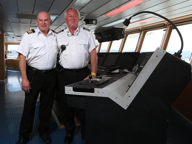 Chief officer Rod Quinn, left, and Master John Highton on the bridge. Picture: NIKKI DAVIS-JONES