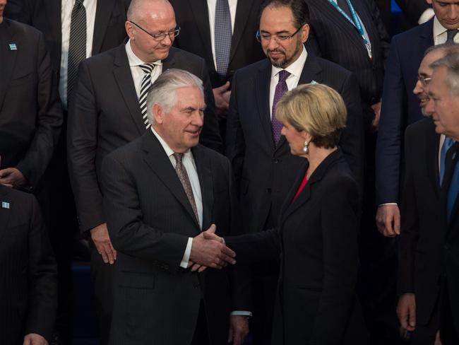 Foreign Minister Julie Bishop shows the relationship between Australia and the US is still OK as she shakes hands with US Secretary of State Rex Tillerson (2nd L). Picture: AFP