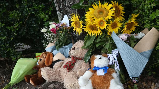 Flowers and teddies left for the boy outside Goodstart Early Learning Centre. Picture: Brendan Radke