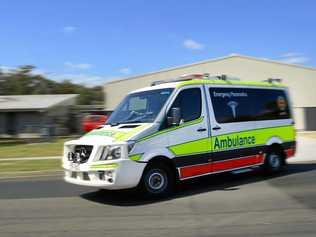 Queensland Ambulance Service Paramedics are on the scene of a motorbike crash. Picture: David Nielsen