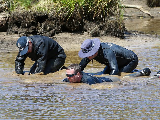 Police Search and Rescue check a dam in Burns Lane Toolern Vale as the search goes on for missing Avondale Heights woman Karen Ristevski. Picture: Ian Currie