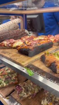 Aussies queue for opening of new pizza joint