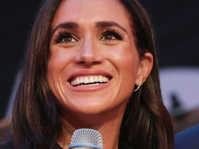 DUESSELDORF, GERMANY - SEPTEMBER 12: Prince Harry, Duke of Sussex and Meghan, Duchess of Sussex speak on stage at the "Friends @ Home Event" at the Station Airport during day three of the Invictus Games DÃÂ¼sseldorf 2023 on September 12, 2023 in Duesseldorf, Germany. (Photo by Chris Jackson/Getty Images for the Invictus Games Foundation)