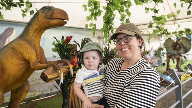 Freddie and Naomi Dinsmore check out the dinosaur display at Toowoomba Royal Show, Thursday, April 18, 2024. Picture: Kevin Farmer