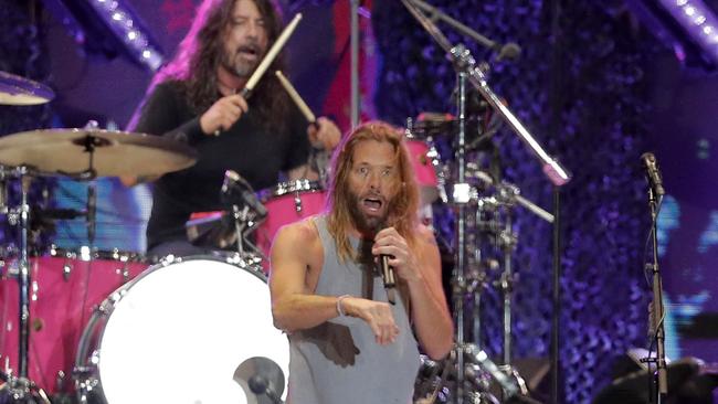 Foo Fighters' drummer Taylor Hawkins and lead singer Dave Grohl on stage, at the Lollapalooza 2022 music festival in Santiago. Picture: Javier Torres/AFP