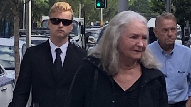 Lincoln Mobbs (left), 18, of Baulkham Hills, enters Manly Local Court with supporters where he was sentenced on a string of serious driving charges, including drink driving, after doing a 10-second burn out in front of police at Wheeler Heights. Picture: Jim O'Rourke