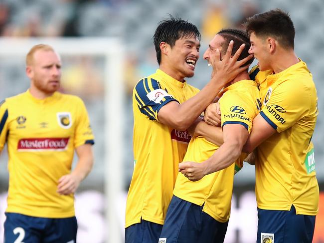 Giancarlo Gallifuoco of the Mariners celebrates scoring a goal with team mates during the Round 7 A-League match between Central Coast Mariners and Western United at Central Coast Stadium in Gosford, Sunday, November 24, 2019. (AAP Image/Brendon Thorne) NO ARCHIVING, EDITORIAL USE ONLY