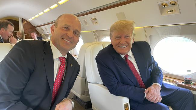 Heritage Foundation President Kevin Roberts with former president Donald Trump on a private plane in April 2022.