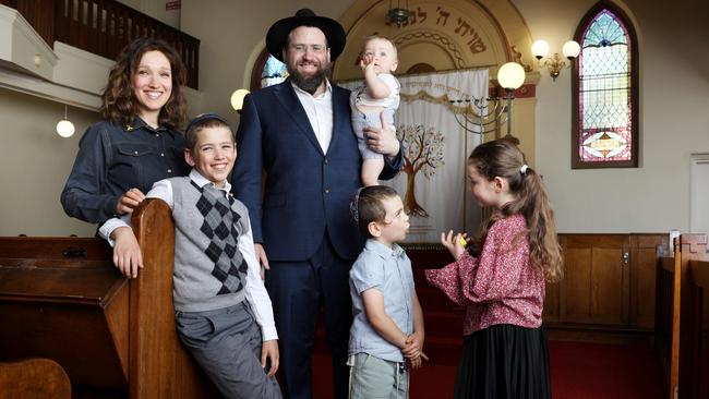 Rabbi Eli Feldman and Rebbetzin Elka Feldman, Yisroli, 11, Bassi, 8, Moshe, 5, and Shalom, 1.