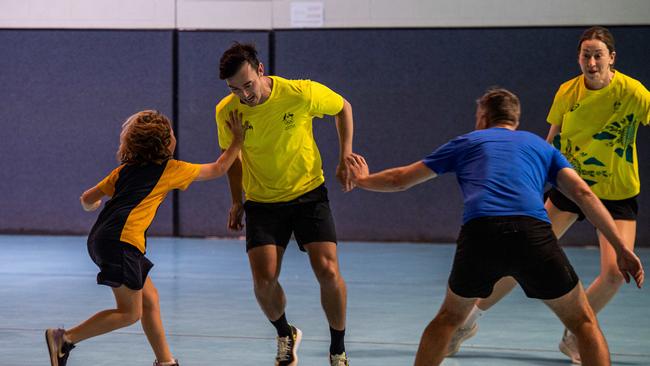 Nick Timmings get caught at spider and flies as Olympians run training drills with Katherine kids at the YMCA as part of Olympics Unleashed program. Picture: Pema Tamang Pakhrin