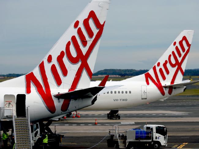 SYDNEY, AUSTRALIA - NewsWire Photos - SEPTEMBER 09, 2022: General generic editorial stock image of Virgin airplane at Sydney Domestic Airport. Picture: NCA NewsWire / Nicholas Eagar