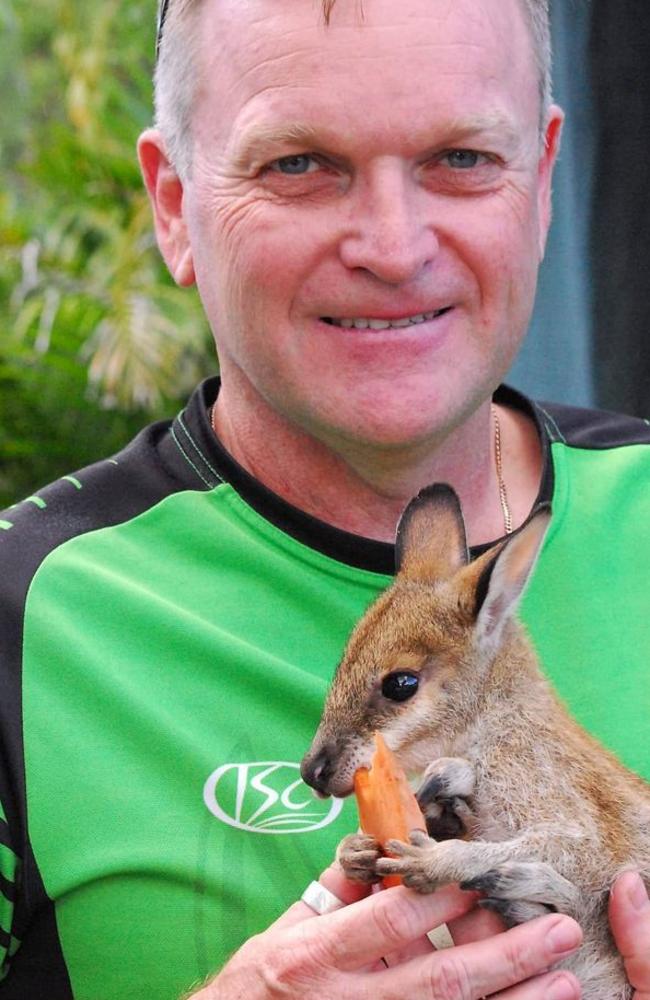 Hope the Agile Wallaby with Mark Jacobsen, who found her lying next to her deceased mother. Picture: NQ Wildlife Care/Janine Moore