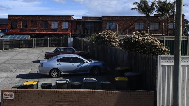 A view across the car park to the units where the stabbing occurred.