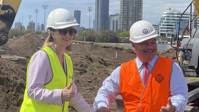 Councillor Brooke Patterson and Mayor Tom Tate turn the first sod on the new play area at Broadwater Parklands, which is due to open in late 2022.