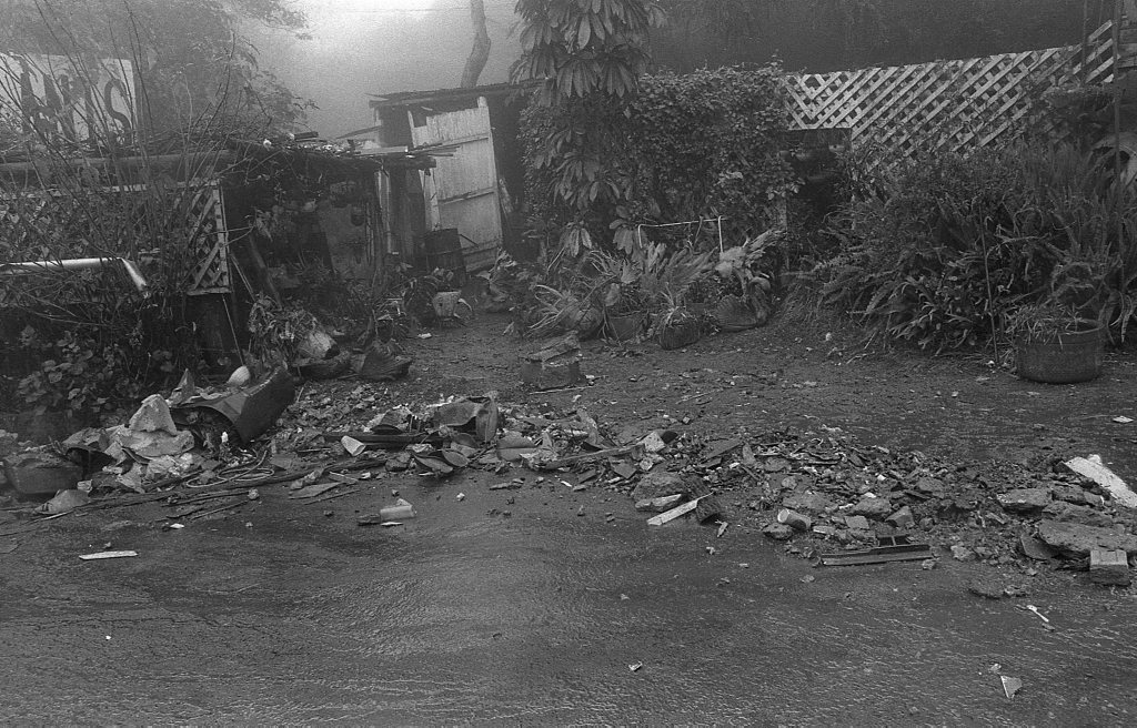 Historic: Toowoomba: Accidents: Clean up at the Log Cabin Service Station the morning after a semi-trailer rolled and crashed in the building removing most of the front of the station. The owner in 1978, Mr Neville Hammond started rebuilding immediately. Photo: Bruce Mackenzie / The Chronicle Neg: U875. Picture: Bruce Mackenzie