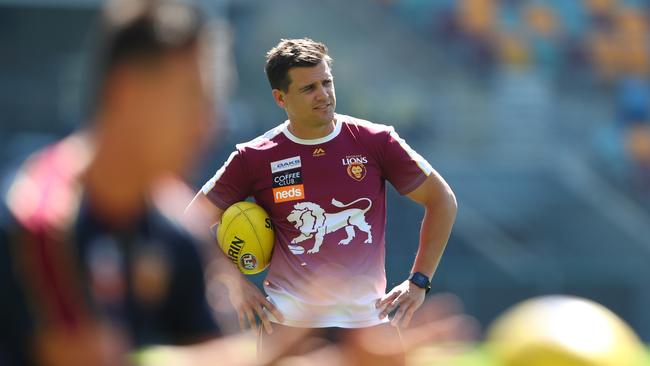 Assistant coach Jed Adcock keeps an eye on Lions training.