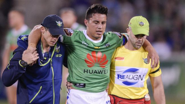 Joe Tapine leaves the field with an ankle injury. Picture: AAP