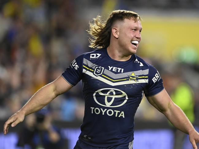 TOWNSVILLE, AUSTRALIA - JULY 06: Reuben Cotter of the Cowboys celebrates after scoring a try during the round 18 NRL match between North Queensland Cowboys and Manly Sea Eagles at Qld Country Bank Stadium, on July 06, 2024, in Townsville, Australia. (Photo by Ian Hitchcock/Getty Images)