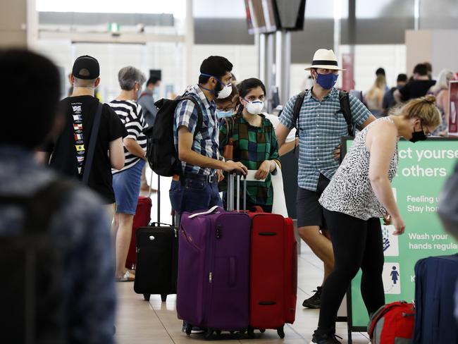 A busy departures terminal at Sydney Domestic Airport after Sydneys northern beaches was declared a COVID-19 hotspot. Picture: Jonathan Ng