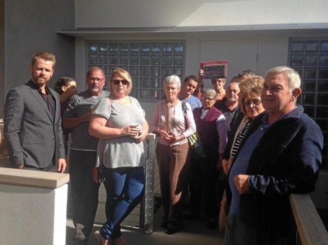 Residents of Peregian Springs who have been locked out of an AGM.