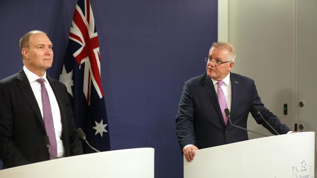 National COVID Commission chair Nev Power (left) speaks at a press conference with Prime Minister Scott Morrison in July last year. Picture: NCA NewsWire / Damian Shaw