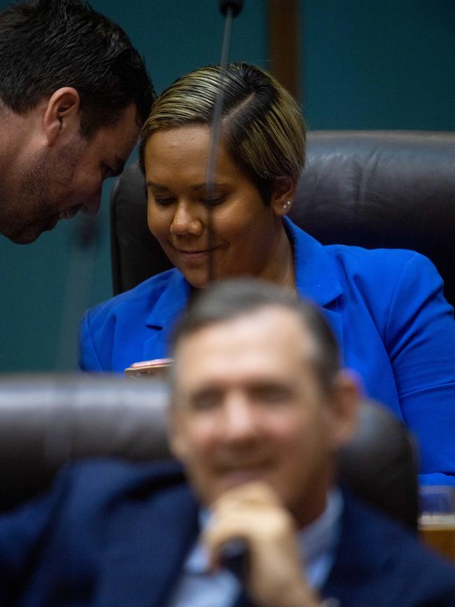 Hon Chanston Paech chats to Hon Selena Uibo on the first sitting day of Parliament in 2021. Photograph: Che Chorley