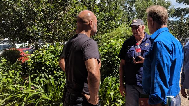 Former Northern Land Council chief executive Joe Morrison (left) speaks with former Darwin Daly Wagait regional council member Paul Henwood (centre) and Indigenous Affairs Minister Nigel Scullion outside Friday’s full council meeting. Picture: Jason Walls