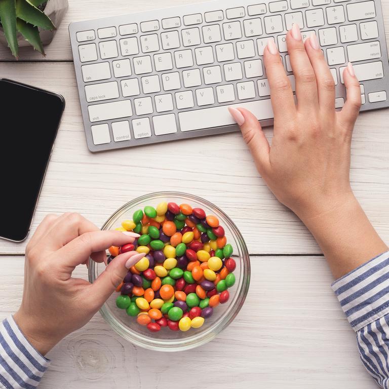 Think twice before reaching for empty afternoon snacks. Picture: iStock